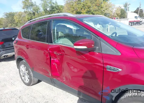 2017 Ford Escape Titanium from USA, damaged, VIN 1FMCU9J95HUD45740